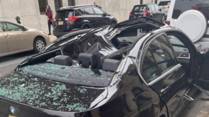 (VIDEO) ¡IMPACTANTE! Hombre cae de un 9no piso, aterriza arriba de un BMW y sobrevive.