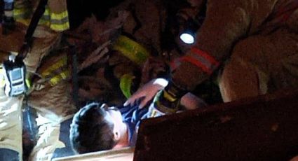 MIAMI FOTOS + VIDEO: Milagroso rescate de un niño con vida tras derrumbe de un edificio residencial