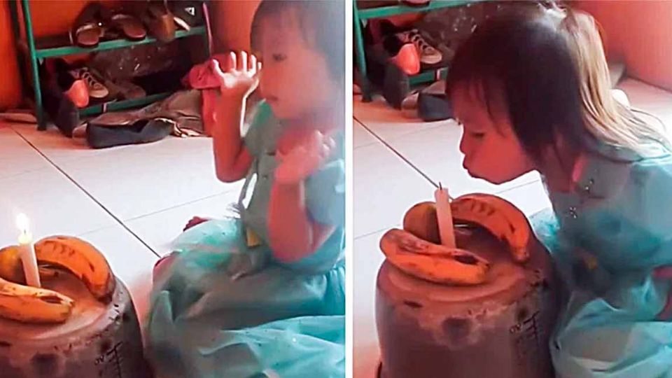 A pesar de lo sencillo de su pastel la niña estaba muy emocionada por su cumpleaños