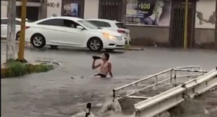 VIDEO: Con caguama en mano, hombre disfruta inundación