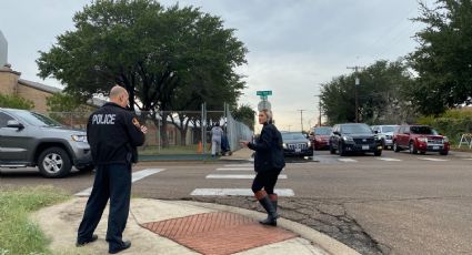 Detienen a hombres armados alrededor de primaria