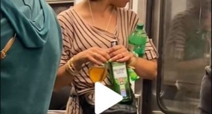 Antes muerta que sencilla... Mujer se transporta en Metro de la CDMX con whisky en mano