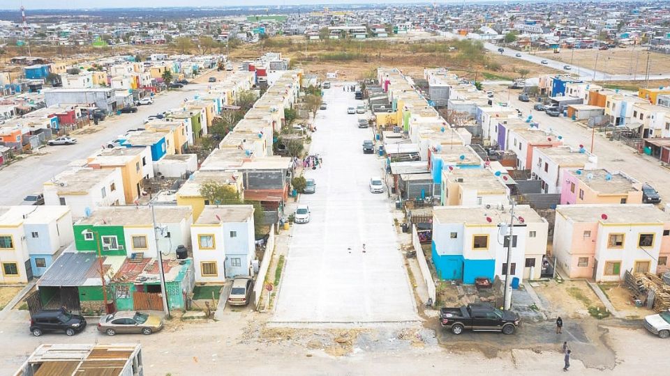 La calle Recompensa fue pavimentada con concreto, pero también se arregló el drenaje.