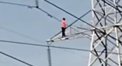 IMAGENES FUERTES: Hombre sube a torre de alta tensión para saltar