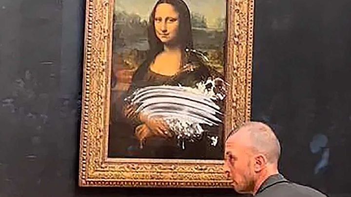 VIDEO: Disfrazado de inválido, un hombre le sorraja un pastelazo a la Mona Lisa