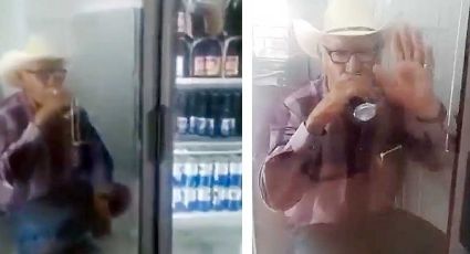 VIDEO Cansado del calor, ranchero de General Terán se encierra en el refri para echarse sus 'chelas'