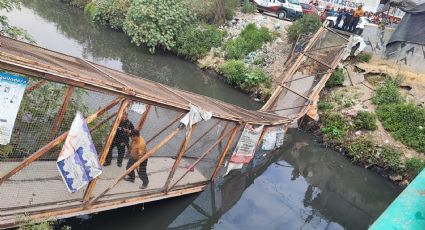 Se desploma puente peatonal y caen personas a canal de aguas negras