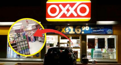 Captan en Oxxo a empleado que se esconde para no atender | VIDEO