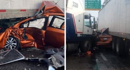 Momento exacto en el que conductor sale ileso de su auto, aplastado por tráiler | VIDEO