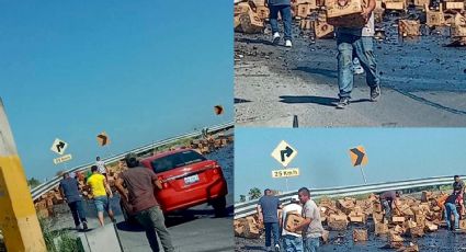 Vuelca camión con cerveza en Carretera Reynosa-Monterrey; no faltó la rapiña