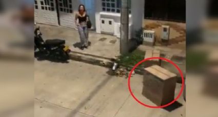 Esposa descubre infidelidad y amante escapa ¡escondida en una caja! | VIDEO