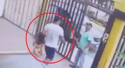 Conserje salva a una niña de ser raptada; su madre la descuidó un segundo | VIDEO