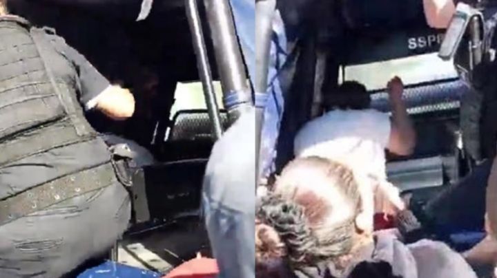 Madre golpea a presunta asesina de su hijo; se subió a la patrulla para amenazarla | VIDEO