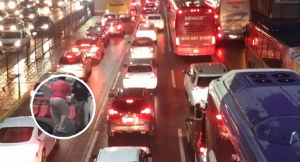 Pelean mujer y hombre a golpes en plena avenida tras incidente vial I VIDEO