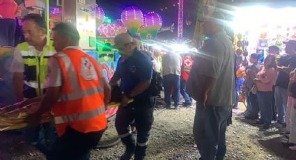 Falla juego mecánico en una feria y ocho niños resultan heridos