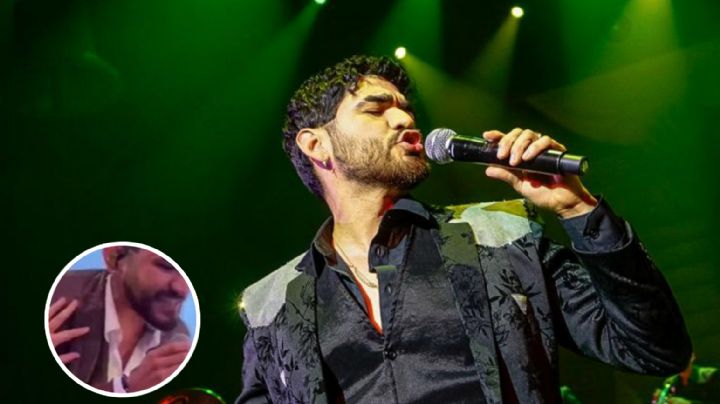 Vocalista de El Recodo es acosado por una fan en pleno concierto | VIDEO