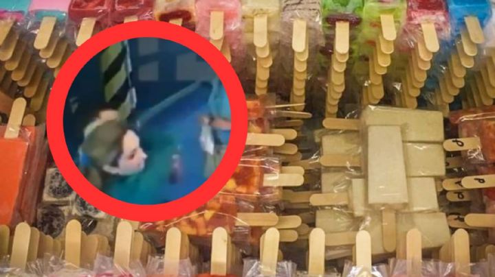MOMENTO EXACTO en que enfermera ataca por celos a empleada en paletería | VIDEO