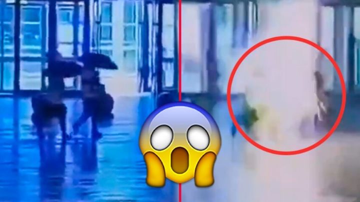 MOMENTO EXACTO en que rayo cae sobre peatones en plena tormenta eléctrica | VIDEO