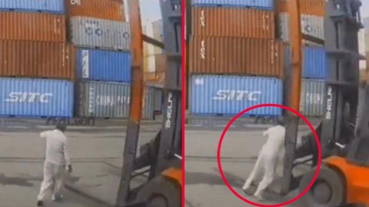 MOMENTO EXACTO en que trabajador se distrae con su teléfono y termina aplastado por montacargas | VIDEO