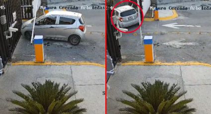 Mujer cafre derriba portón de fraccionamiento privado y lo deja inservible | VIDEO