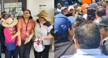 Pobladores irrumpen oficinas del SAT; exigen devolución de sus impuestos | VIDEO
