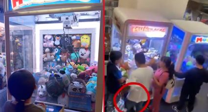 Familia usa a niña para saquear máquina de peluches en centro comercial | VIDEO