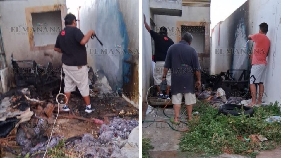 Los vecinos usaron sus mangueras para controlar el incendio.
