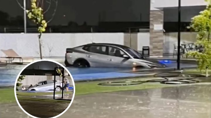 Automovilista cae a una alberca a causa de las lluvias; cámaras captaron el momento | VIDEO